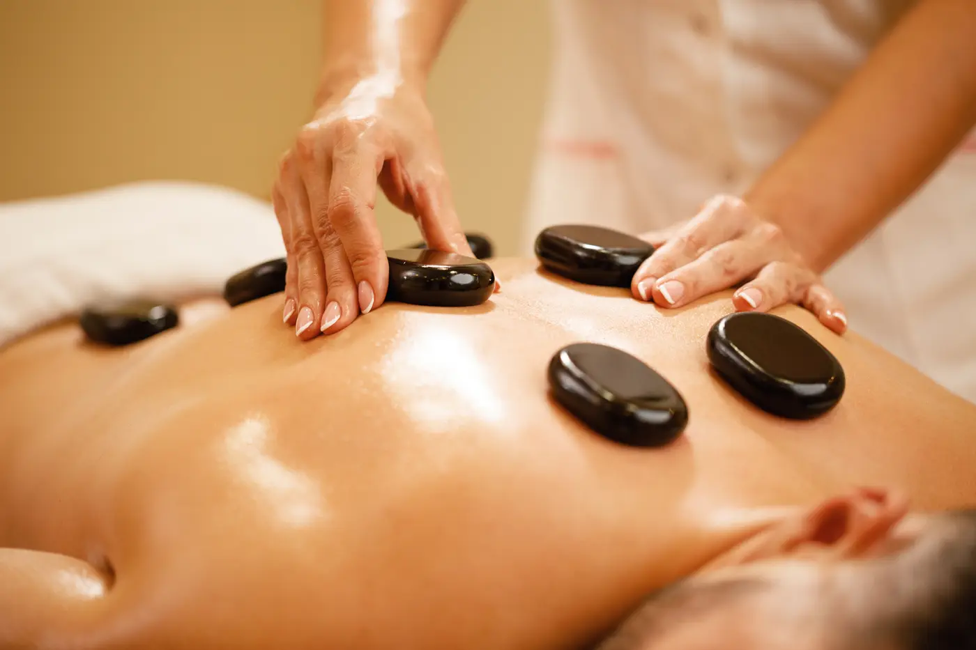 Whole Body Hot Stone Massage at home.