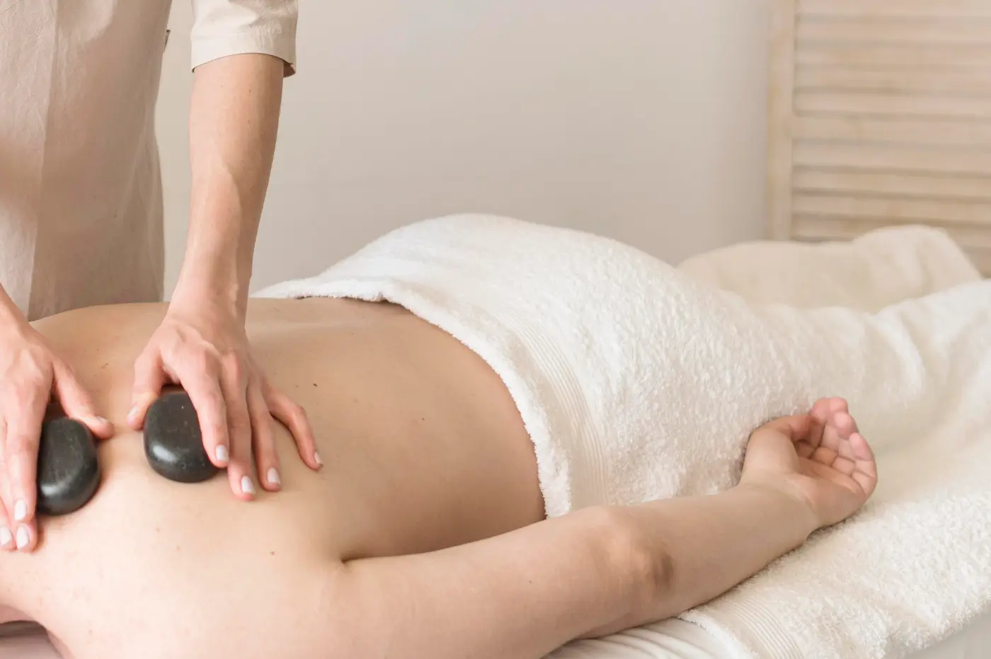 Whole Body Hot Stone Massage at home.